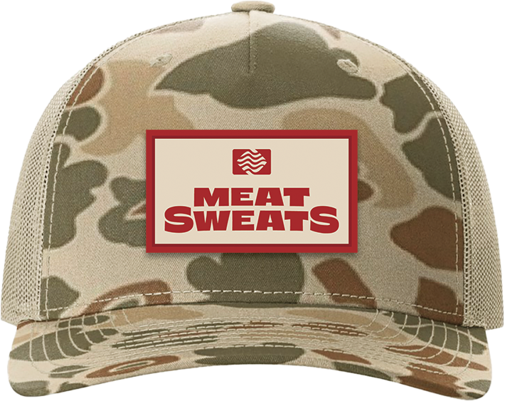 Front of Meat Sweats camo hat with red-and-cream custom logo patch